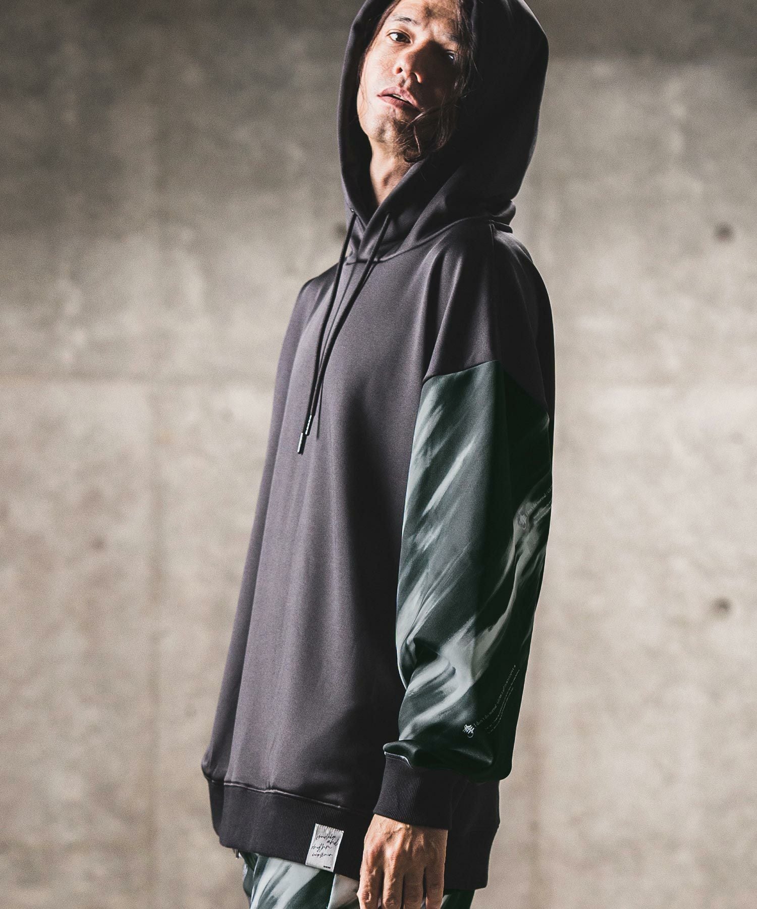 60%OFF【GLIMCLAP(グリムクラップ)】One arm patterned design hooded