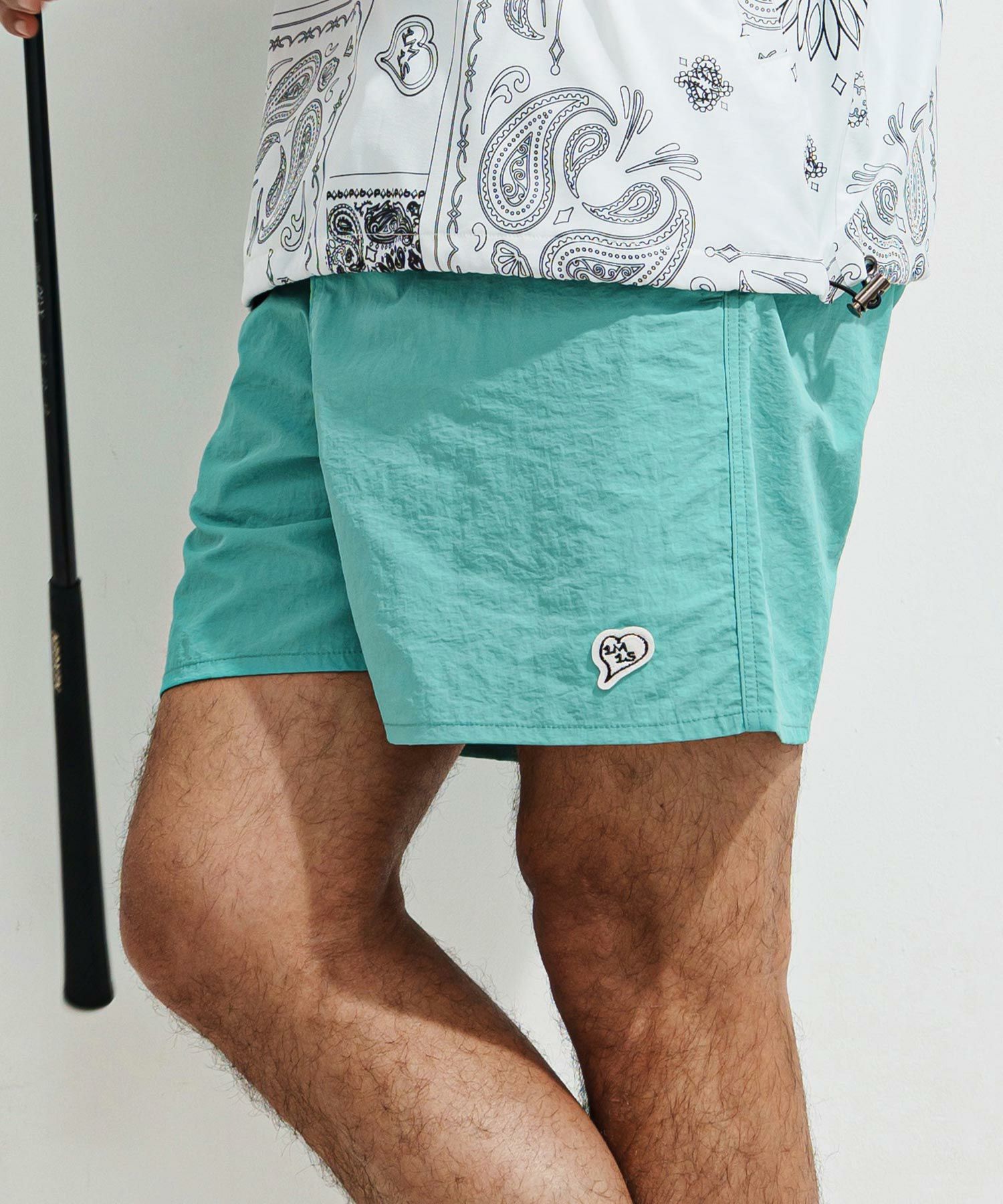 定価1.5万 ワンミニットワンセカンド nylon swim shorts 1minute 1second(ワンミニットワンセカンド)】heart patch shrink
