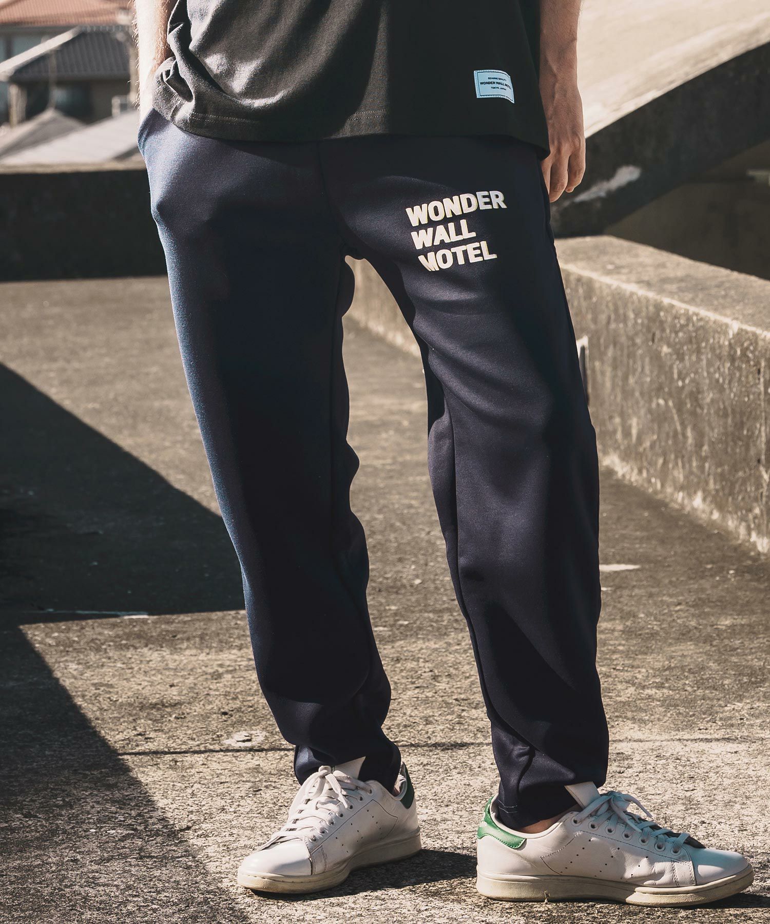 WONDER WALL MOTEL(ワンダーウォールモーテル)】Tapered Sweat Pants