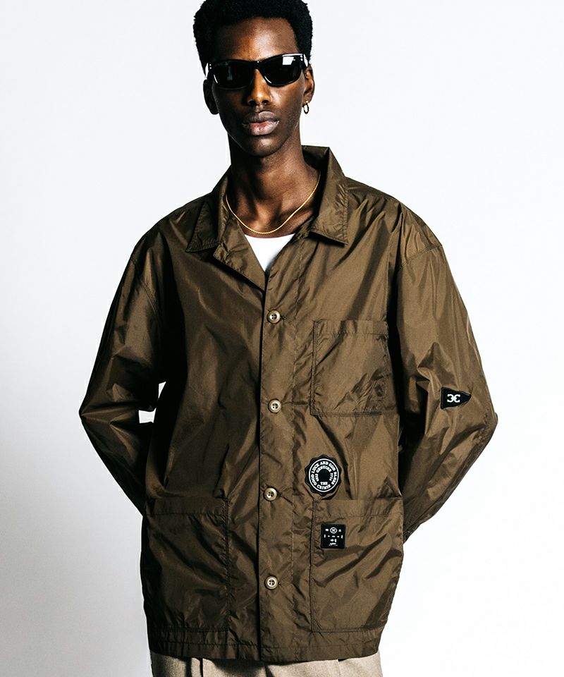 CRIMIE(クライミー)】PATCHWORK LOGO NYLON WINDBREAKER SHIRT JACKET
