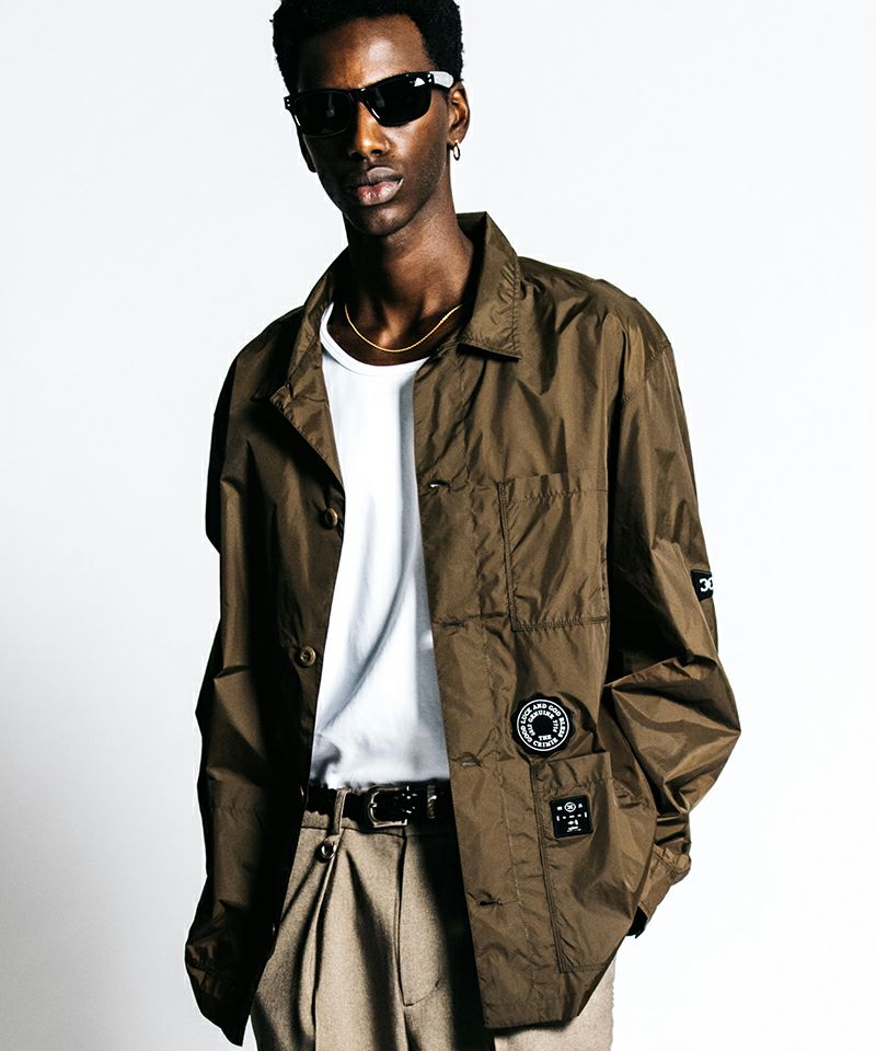 CRIMIE(クライミー)】PATCHWORK LOGO NYLON WINDBREAKER SHIRT JACKET