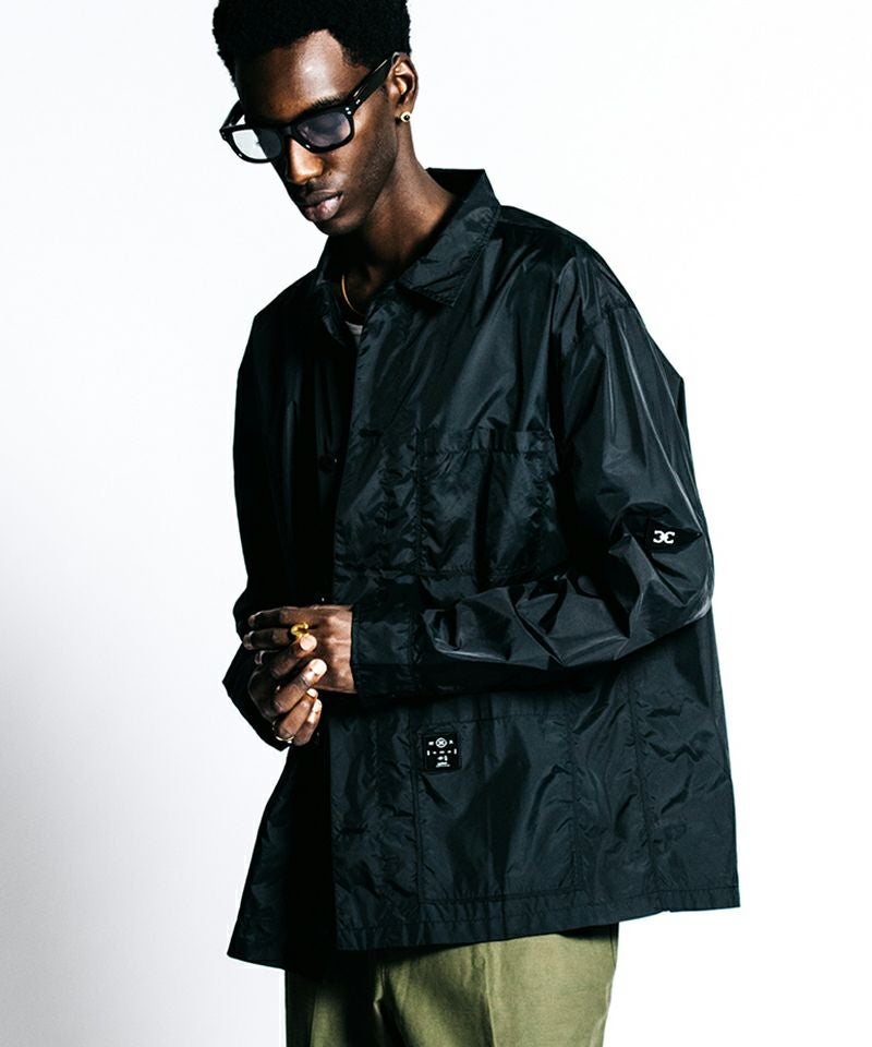 CRIMIE(クライミー)】PATCHWORK LOGO NYLON WINDBREAKER SHIRT JACKET