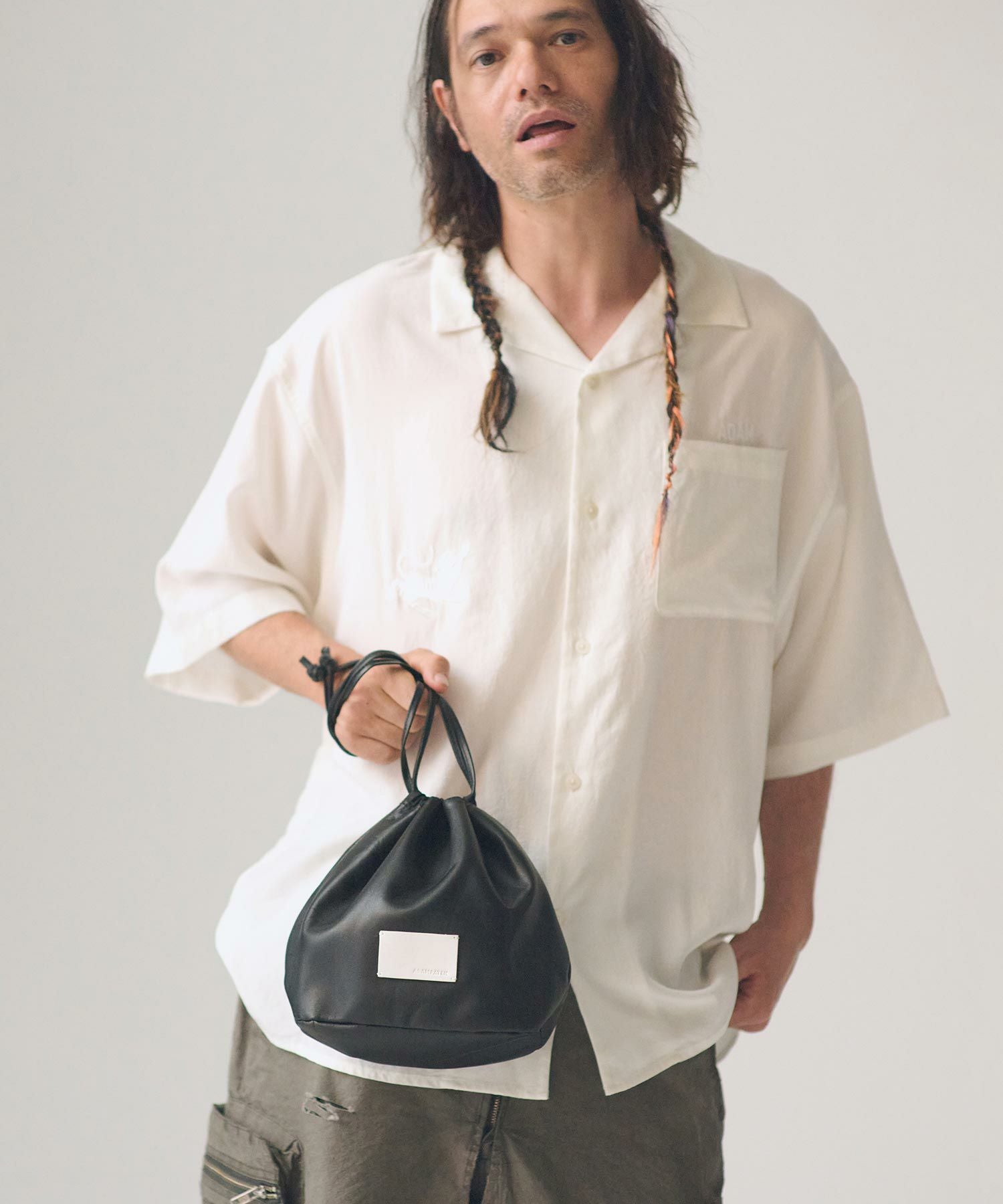 ADAM PATEK(アダムパテック)】water repellent leather drawstring bag