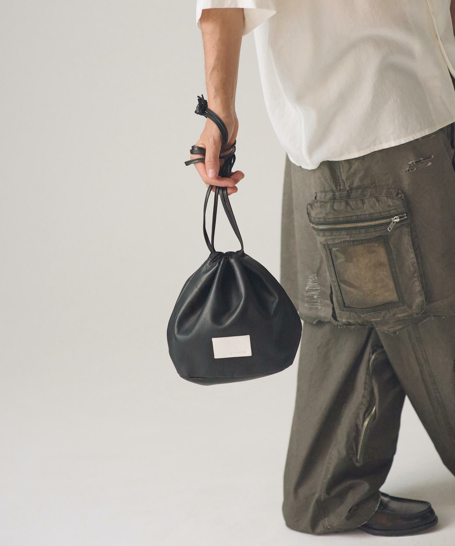 ADAM PATEK(アダムパテック)】water repellent leather drawstring bag